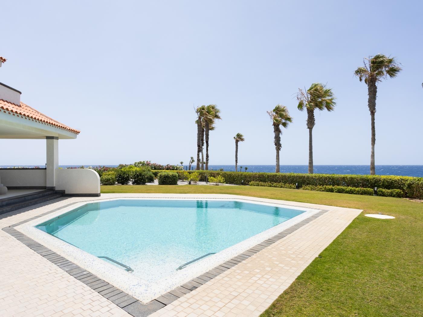 Villa Fiorita | Beachfront + Heated Private Pool in Amarilla Golf